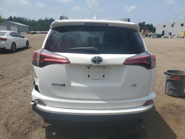 Photo 6 from auction – 2018 TOYOTA RAV4 LE with VIN 2T3ZFREV2JW432245