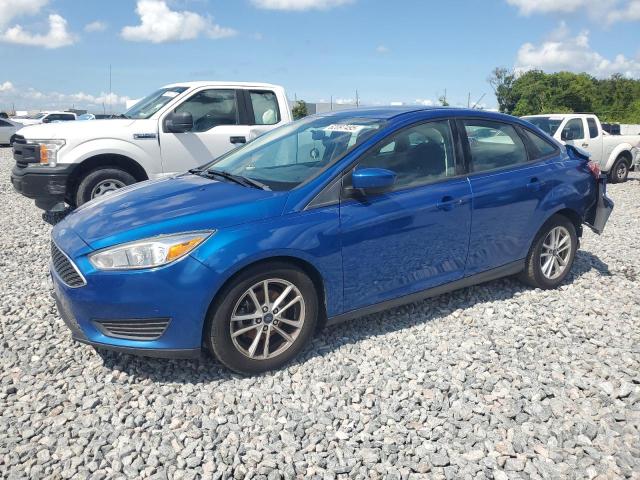 FORD FOCUS SE 2018 with VIN 1FADP3F22JL300040 - Photo from auction