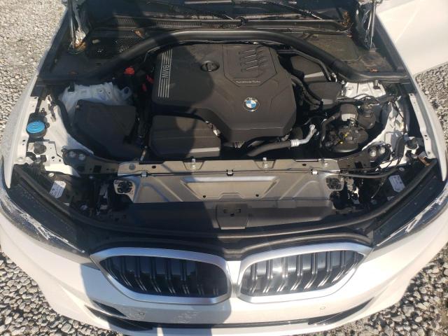 Photo 11 from auction – 2024 BMW 330I with VIN 3MW69FF01R8E84786