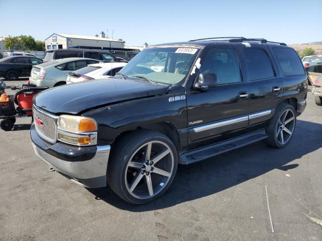 GMC YUKON 2002 with VIN 1GKEC13T52R146938 - Photo from auction