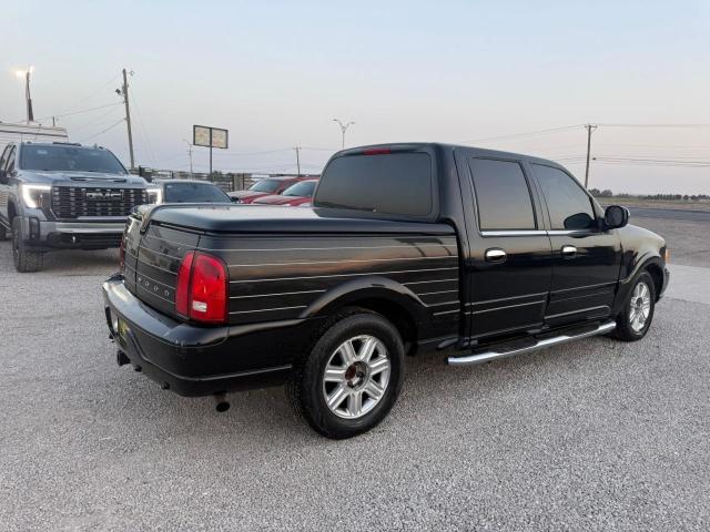 Photo 4 from auction – 2002 LINCOLN BLACKWOOD with VIN 5LTEW05A32KJ01138