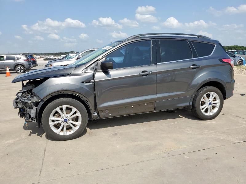 FORD ESCAPE SE 2018 with VIN 1FMCU0GD8JUA44134 - Photo from auction