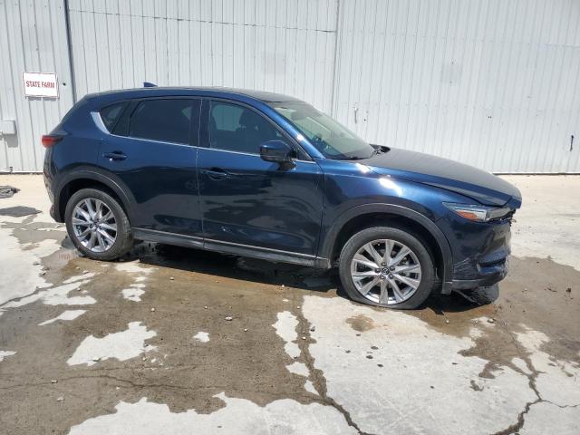 Photo 4 from auction – 2021 MAZDA CX-5 GRAND with VIN JM3KFBAY0M0347932