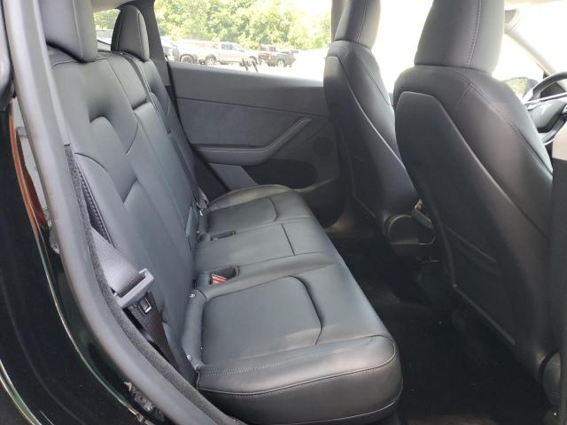 Photo 11 from auction – 2023 TESLA MODEL Y with VIN 7SAYGDEE2PA182998