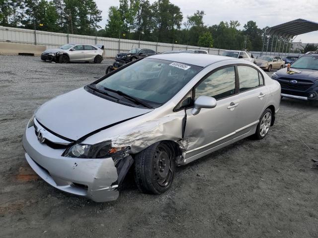 HONDA CIVIC LX 2011 with VIN 19XFA1F59BE034593 - Photo from auction