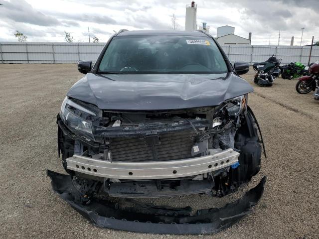 Photo 5 from auction – 2018 HONDA PILOT ELIT with VIN 5FNYF6H09JB013454