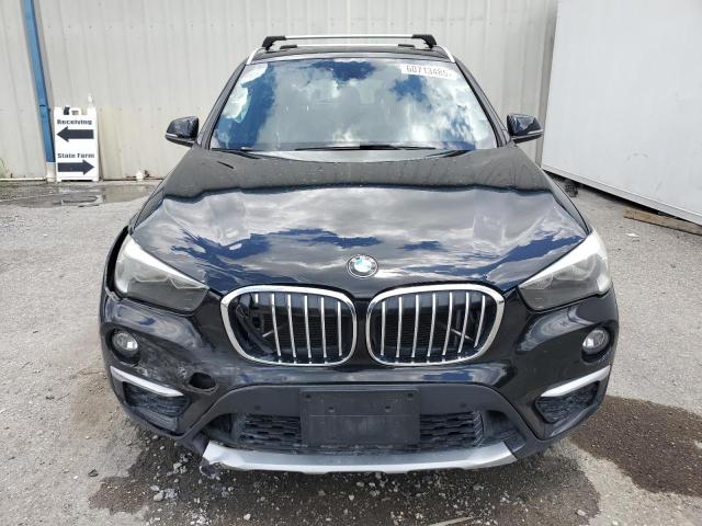 Photo 5 from auction – 2016 BMW X1 XDRIVE2 with VIN WBXHT3C34G5E54952