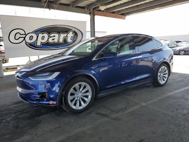 TESLA MODEL X 2017 with VIN 5YJXCDE23HF060312 - Photo from auction