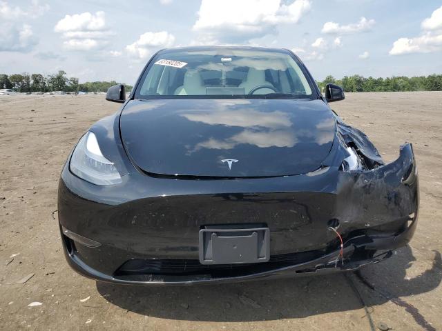 Photo 5 from auction – 2023 TESLA MODEL Y with VIN 7SAYGDEF8PF920783