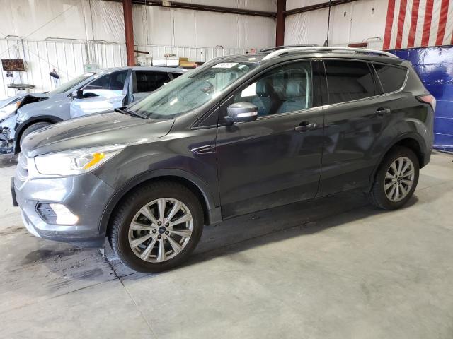 FORD ESCAPE TIT 2017 with VIN 1FMCU9J96HUC96287 - Photo from auction