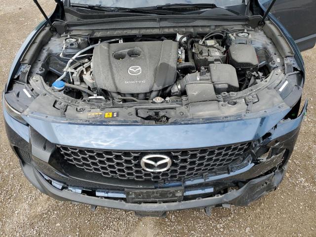 Photo 12 from auction – 2024 MAZDA CX-50 PREM with VIN 7MMVABDM2RN157055