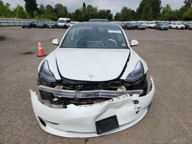 Photo 5 from auction – 2021 TESLA MODEL 3 with VIN 5YJ3E1EA4MF854809
