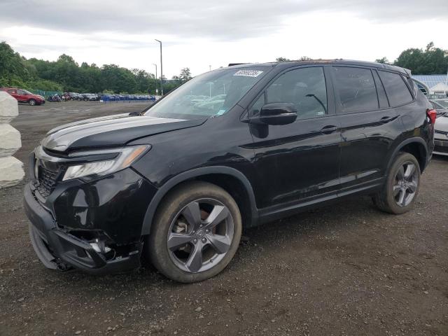HONDA PASSPORT TOURING 2021 with VIN 5FNYF8H91MB036614 - Photo from auction