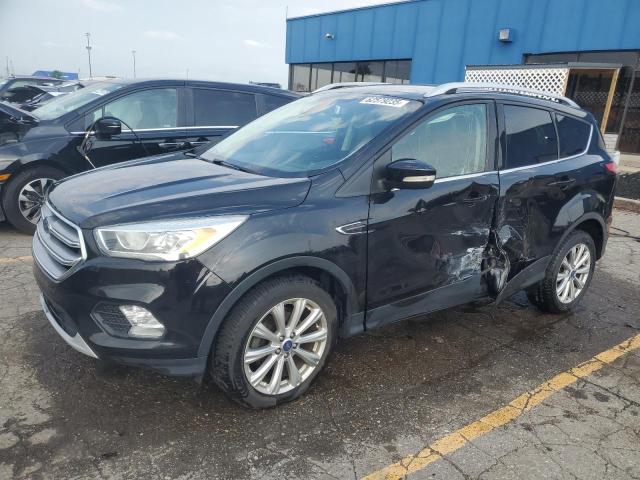 FORD ESCAPE TIT 2017 with VIN 1FMCU0JD3HUD75593 - Photo from auction