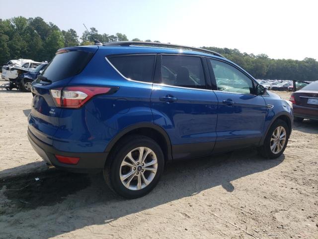 Photo 3 from auction – 2018 FORD ESCAPE SE with VIN 1FMCU9GD9JUC53693