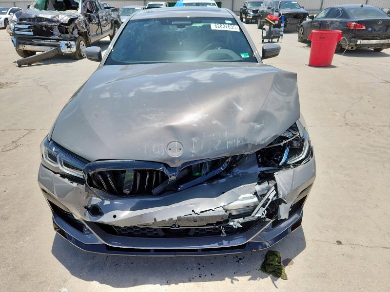 Photo 5 from auction – 2022 BMW M550XI with VIN WBA13BK01NCJ63098