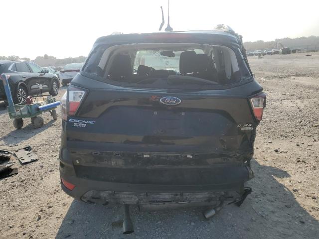 Photo 6 from auction – 2018 FORD ESCAPE TIT with VIN 1FMCU0J95JUC49589