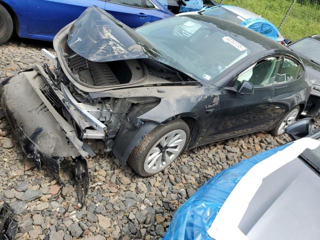 TESLA MODEL 3 2022 with VIN 5YJ3E1EA3NF288398 - Photo from auction