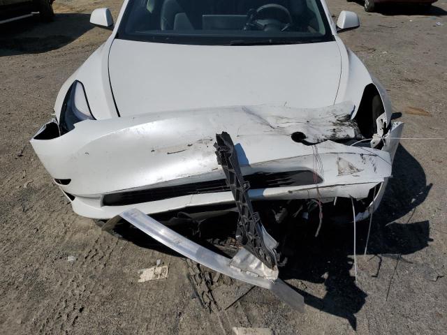 Photo 11 from auction – 2023 TESLA MODEL 3 with VIN 5YJ3E1EA1PF560501