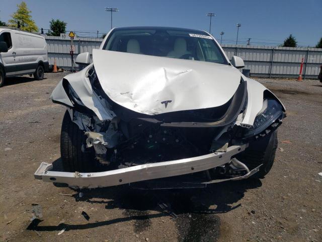 Photo 5 from auction – 2023 TESLA MODEL Y with VIN 7SAYGAEE3PF665191