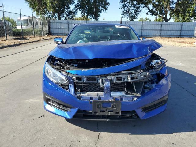 Photo 5 from auction – 2018 HONDA CIVIC LX with VIN 2HGFC4B02JH307741