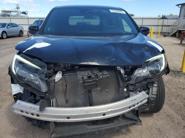 Photo 5 from auction – 2021 HONDA PASSPORT E with VIN 5FNYF7H55MB005616