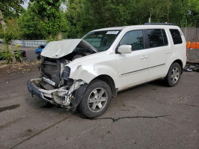 HONDA PILOT TOUR 2011 with VIN 5FNYF4H91BB085172 - Photo from auction