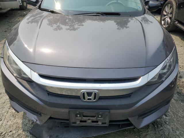 Photo 11 from auction – 2017 HONDA CIVIC EX with VIN 2HGFC2F74HH523581