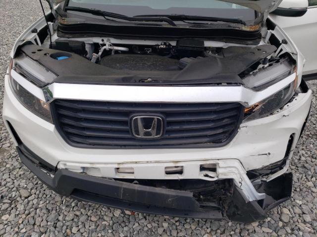 Photo 11 from auction – 2022 HONDA RIDGELINE with VIN 5FPYK3F57NB001597