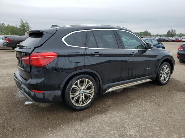 Photo 3 from auction – 2017 BMW X1 XDRIVE2 with VIN WBXHT3C34H5F82643