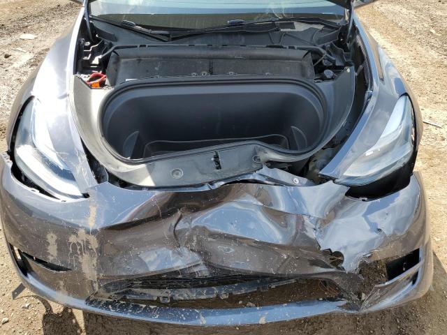 Photo 11 from auction – 2023 TESLA MODEL Y with VIN 7SAYGDEE4PF822924