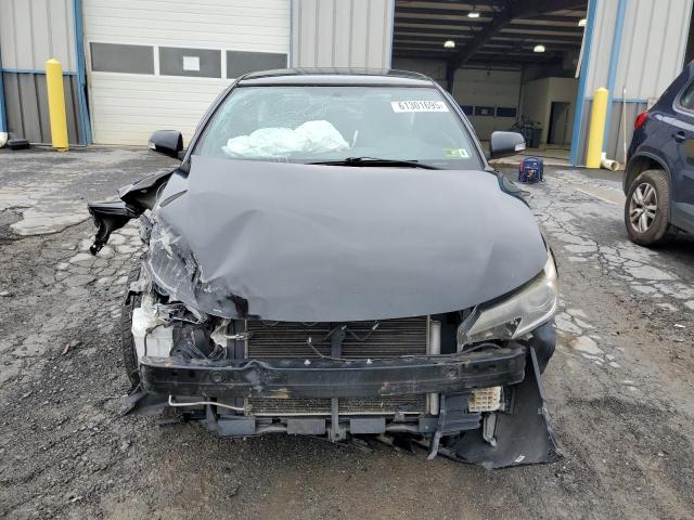 Photo 5 from auction – 2014 TOYOTA SCION TC with VIN JTKJF5C72E3077346