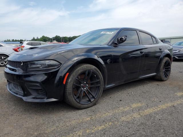 DODGE CHARGER 2021 with VIN 2C3CDXL93MH660916 - Photo from auction