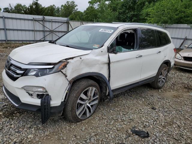 HONDA PILOT ELIT 2017 with VIN 5FNYF6H01HB032574 - Photo from auction