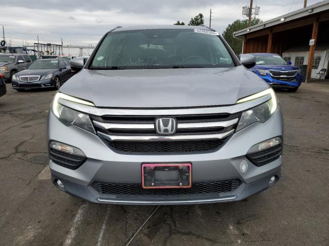 Photo 5 from auction – 2017 HONDA PILOT TOURING with VIN 5FNYF6H97HB077680