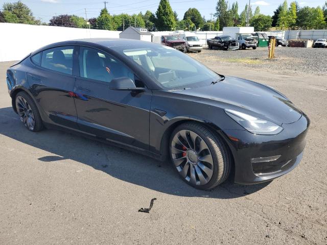 Photo 4 from auction – 2021 TESLA MODEL 3 with VIN 5YJ3E1EC0MF976021