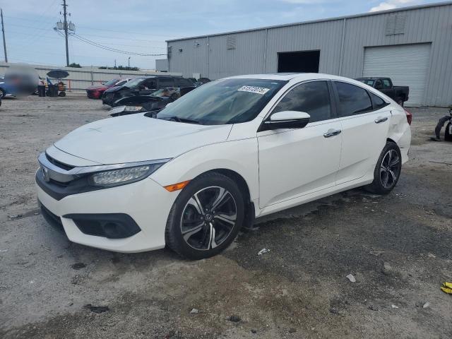 HONDA CIVIC TOUR 2016 with VIN 19XFC1F99GE021802 - Photo from auction