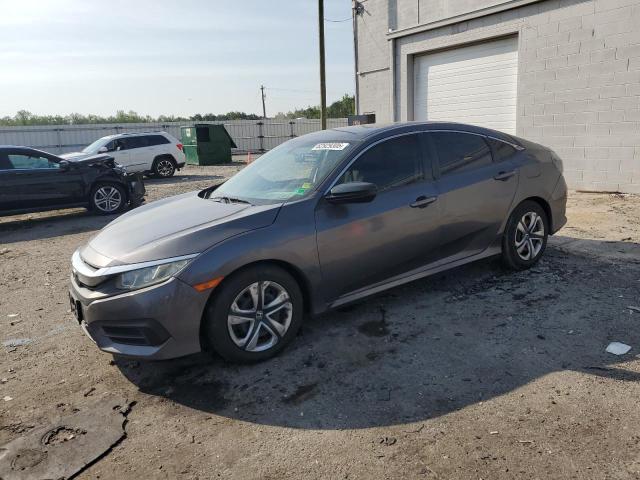 HONDA CIVIC LX 2018 with VIN 19XFC2F50JE040698 - Photo from auction