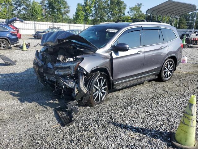 Photo 1 from auction – 2020 HONDA PILOT ELIT with VIN 5FNYF6H00LB044305