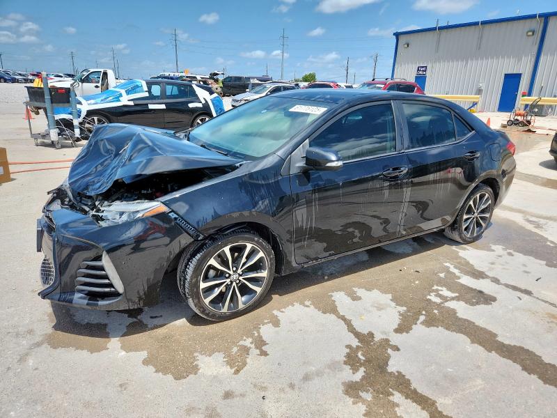 TOYOTA COROLLA L 2019 with VIN 5YFBURHE3KP890715 - Photo from auction