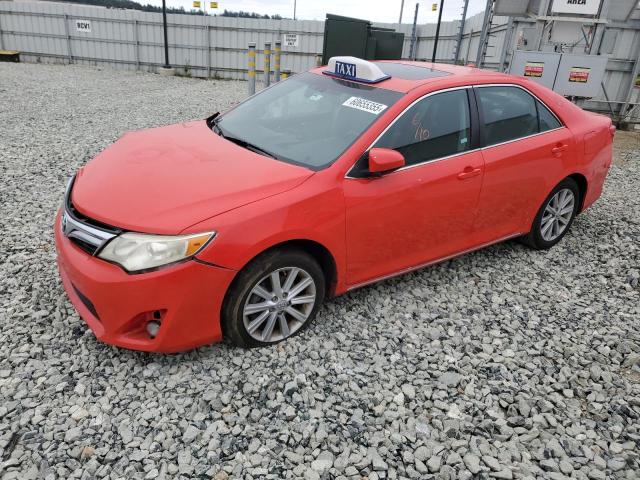 TOYOTA CAMRY HYBR 2014 with VIN 4T1BD1FK8EU120751 - Photo from auction