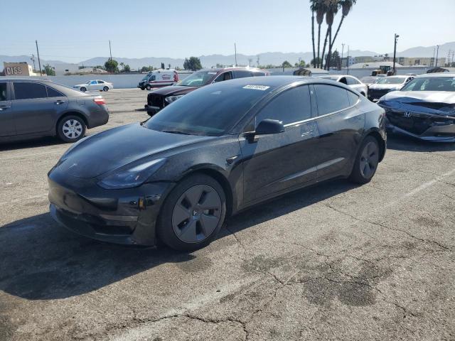 TESLA MODEL 3 2023 with VIN 5YJ3E1EAXPF617522 - Photo from auction