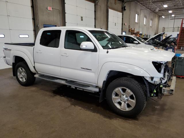 Photo 4 from auction – 2014 TOYOTA TACOMA DOU with VIN 3TMLU4EN8EM144252