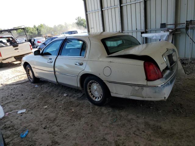 Photo 2 from auction – 1999 LINCOLN TOWN CAR E with VIN 1LNHM81W2XY658371