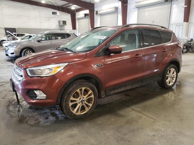 FORD ESCAPE SE 2018 with VIN 1FMCU9GD9JUB73570 - Photo from auction