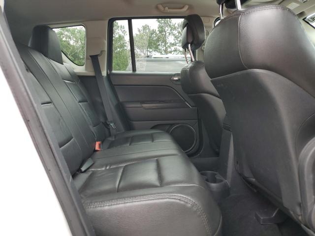 Photo 11 from auction – 2011 JEEP COMPASS SP with VIN 1J4NT1FA2BD239591