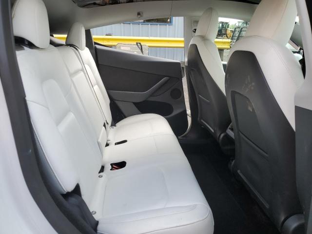 Photo 10 from auction – 2023 TESLA MODEL Y with VIN 7SAYGDEE7PF627884