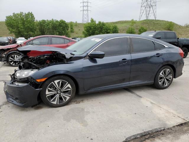 HONDA CIVIC EXL 2018 with VIN JHMFC1F76JX004766 - Photo from auction