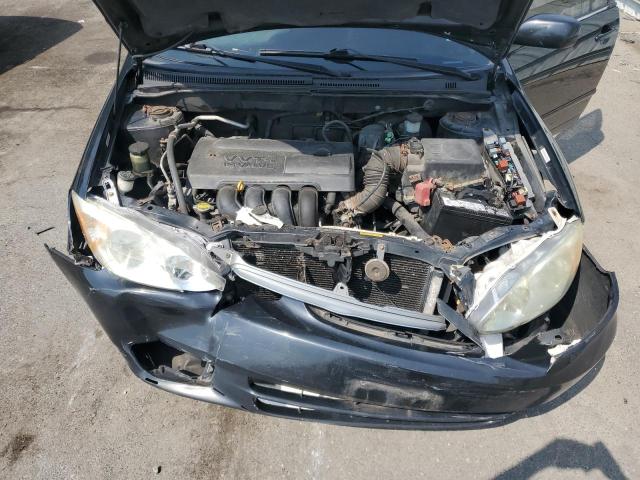 Photo 11 from auction – 2003 TOYOTA COROLLA CE with VIN 2T1BR32E63C101093