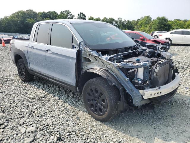 Photo 4 from auction – 2023 HONDA RIDGELINE with VIN 5FPYK3F54PB007182